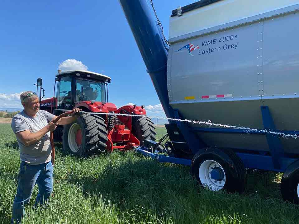 A Walkabout Mother Bin getting power washed prior to the Pacific Northwest field day demonstration